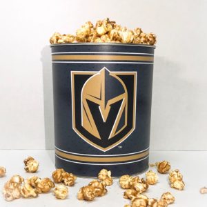 Las Vegas Golden Knights popcorn tin full of popcorn sitting on a white table